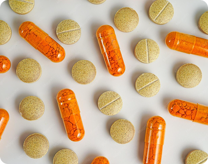 Antibiotic capsules and tablets scattered on a surface