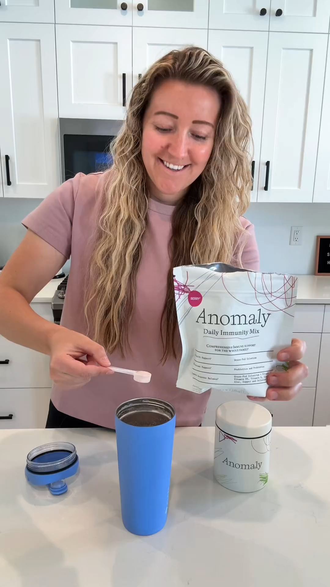 Customer scooping Anomaly into a tumbler
