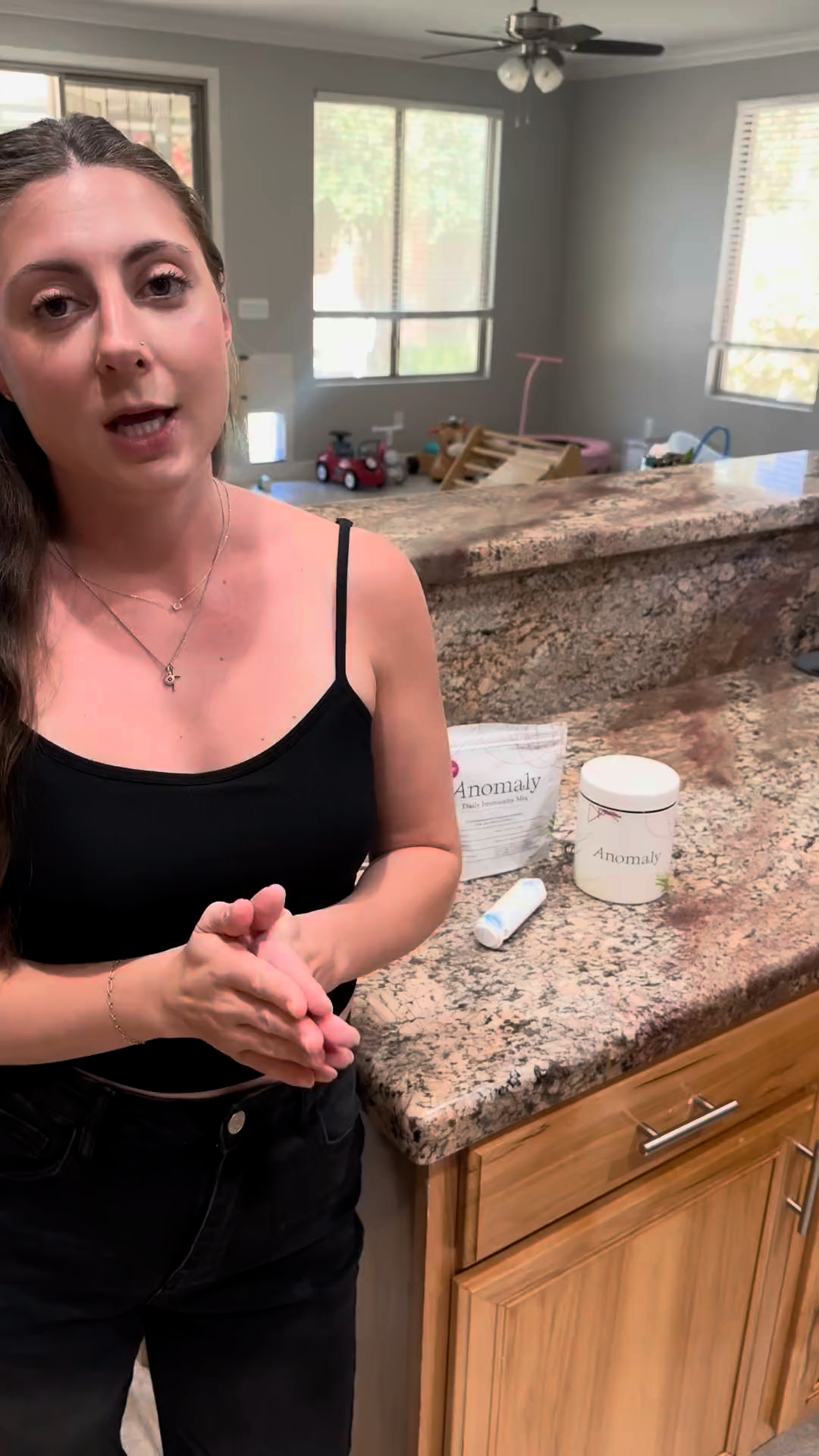 Customer talking in her kitchen