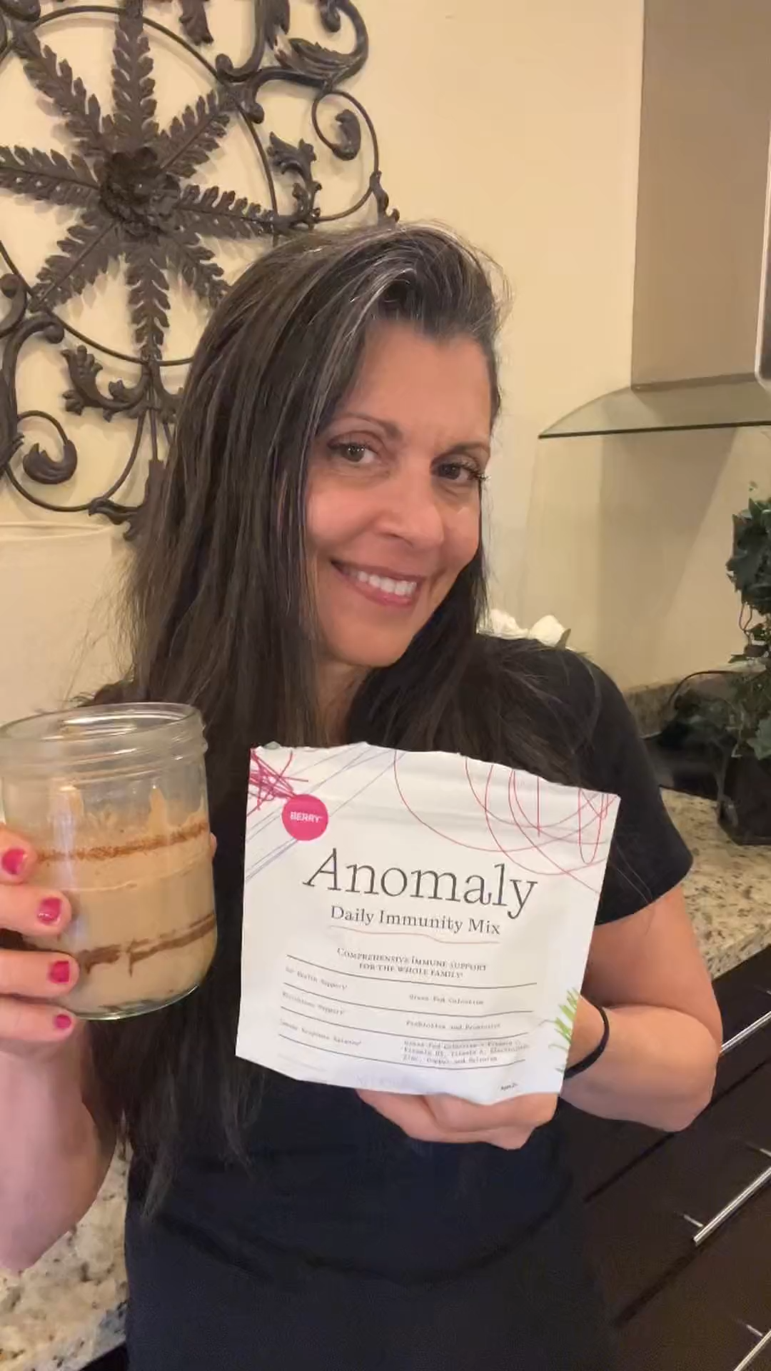 Customer holding an Anomaly bag